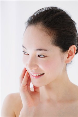 skincare - Young woman with no make-up smiling Stock Photo - Premium Royalty-Free, Code: 622-06964250