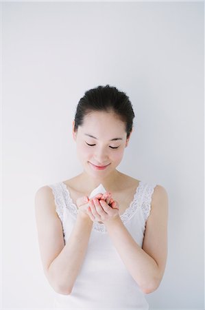 simsearch:622-06964297,k - Young woman with face-wash foam Stock Photo - Premium Royalty-Free, Code: 622-06964268