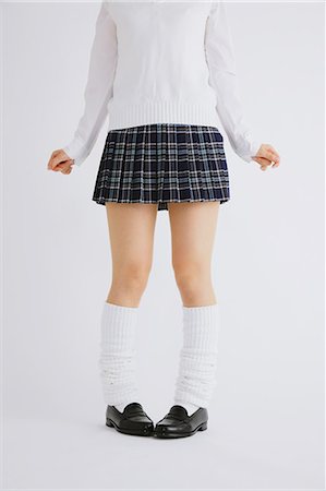 foot jump - Woman in high school uniform Stock Photo - Premium Royalty-Free, Code: 622-06964369