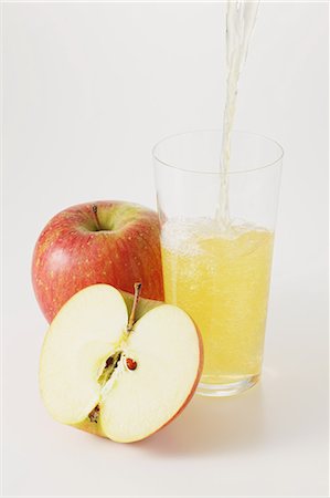 fresh drink white background - Apple juice Stock Photo - Premium Royalty-Free, Code: 622-06964427