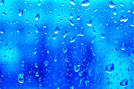 rocío - Raindrops on glass Foto de stock - Sin royalties Premium, Código: 622-07118095