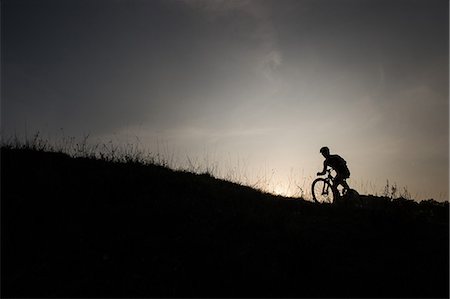 Man riding mountain bike in nature in the Bologna countryside, Italy Stock Photo - Premium Royalty-Free, Code: 622-07736011