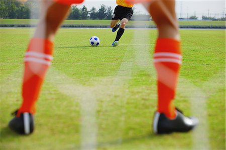 soccer player ball foot - Penalty kick Stock Photo - Premium Royalty-Free, Code: 622-07736070