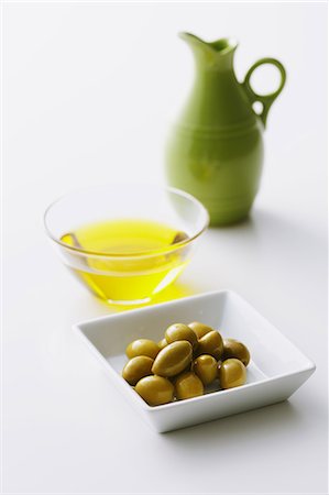 fruits and vegetables white background - Olive oil and olives Stock Photo - Premium Royalty-Free, Code: 622-07743612