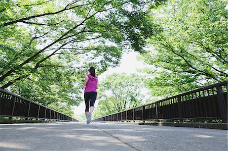 simsearch:622-07760681,k - Young Japanese girl running in the park Stock Photo - Premium Royalty-Free, Code: 622-07760604