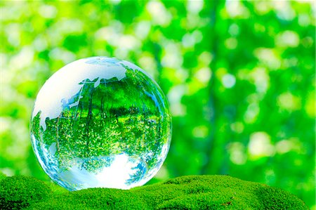 Glass globe in a park Stock Photo - Premium Royalty-Free, Code: 622-07841556