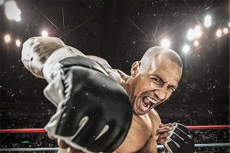 ring (boxe) - Bald male athlete in a fighting pose Photographie de stock - Premium Libres de Droits, Code: 622-08122808