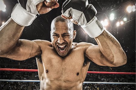 ring (boxe) - Bald male athlete in a fighting pose Photographie de stock - Premium Libres de Droits, Code: 622-08122809