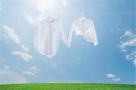 shirt nobody - Laundry drying up on washing line Stock Photo - Premium Royalty-Free, Code: 622-08122815