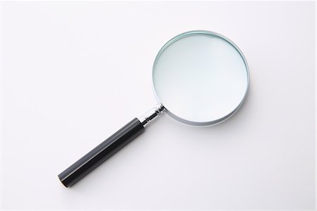 Magnifying glass Photographie de stock - Premium Libres de Droits, Code: 622-08122920