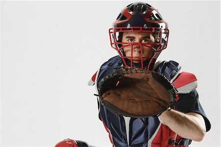 simsearch:622-02621698,k - Baseball catcher against white background Stock Photo - Premium Royalty-Free, Code: 622-08123136