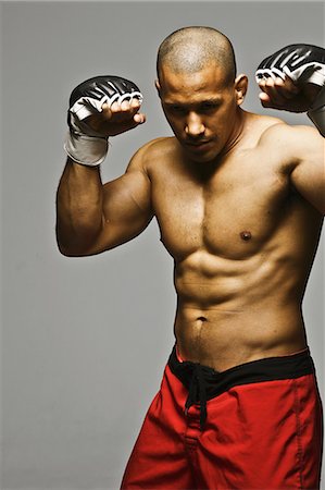 simsearch:622-08123198,k - Bald male athlete in a fighting pose Stock Photo - Premium Royalty-Free, Code: 622-08123185