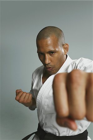 simsearch:622-08123198,k - Bald male athlete in a fighting pose Stock Photo - Premium Royalty-Free, Code: 622-08123204