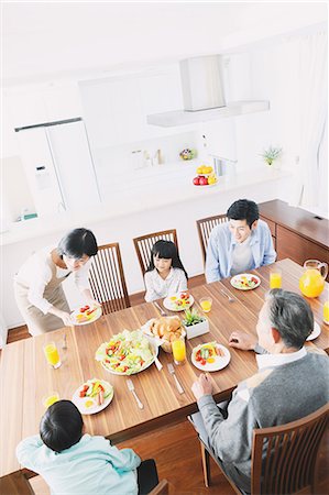 Three-generation Japanese family together in the kitchen Stock Photo - Premium Royalty-Free, Code: 622-08123243