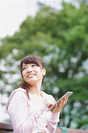 students tablets outside - Young attractive Japanese female University student portrait Stock Photo - Premium Royalty-Free, Code: 622-08123371