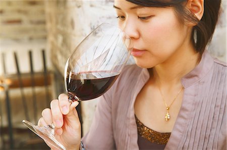 simsearch:622-08138977,k - Young Japanese woman tasting wine in a fashionable bar Stock Photo - Premium Royalty-Free, Code: 622-08138980