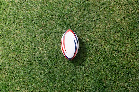 simsearch:622-08355398,k - Rugby ball on grass Foto de stock - Sin royalties Premium, Código: 622-08355396