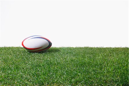 simsearch:622-08355398,k - Rugby ball on grass Foto de stock - Sin royalties Premium, Código: 622-08355409