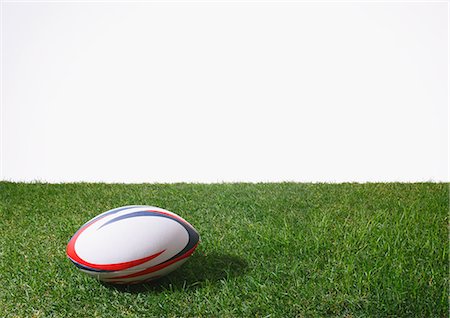 simsearch:622-08355398,k - Rugby ball on grass Foto de stock - Sin royalties Premium, Código: 622-08355417