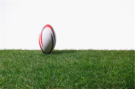 rugby - Rugby ball on grass Foto de stock - Sin royalties Premium, Código: 622-08355410