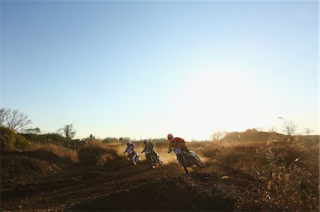 simsearch:622-08355879,k - Motocross bikers on dirt track Photographie de stock - Premium Libres de Droits, Code: 622-08355601