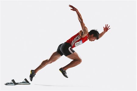 person running with white background - Japanese male athlete Stock Photo - Premium Royalty-Free, Code: 622-08355730