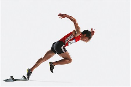 starting block - Japanese male athlete Foto de stock - Royalty Free Premium, Número: 622-08355731