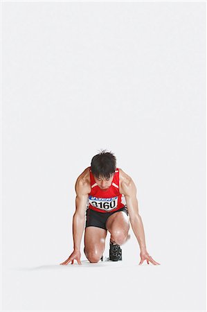 sprinter concentration - Japanese male athlete Stock Photo - Premium Royalty-Free, Code: 622-08355733