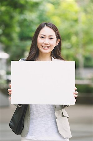 Japanese attractive businesswoman in downtown Tokyo Stock Photo - Premium Royalty-Free, Code: 622-08482400