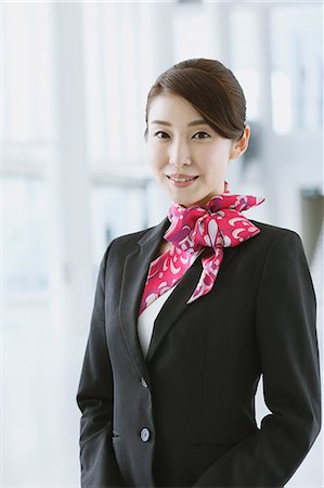 Japanese attractive flight attendant at the airport Photographie de stock - Premium Libres de Droits, Code: 622-08482472