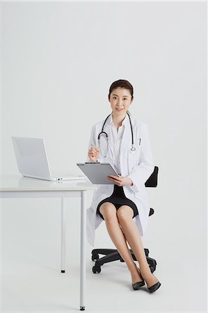 female doctor full body - Attractive Japanese woman doctor Stock Photo - Premium Royalty-Free, Code: 622-08482637