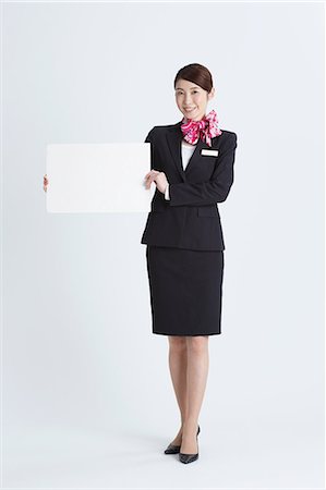 simsearch:622-08482664,k - Attractive Japanese concierge Stock Photo - Premium Royalty-Free, Code: 622-08482651