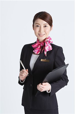 simsearch:622-08482664,k - Attractive Japanese concierge Stock Photo - Premium Royalty-Free, Code: 622-08482653