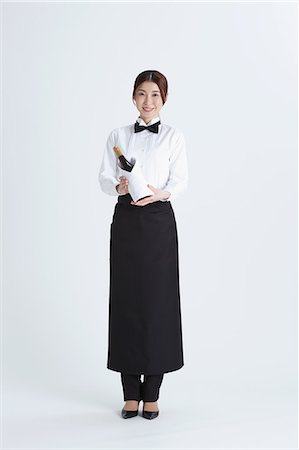 Attractive Japanese sommelier Stock Photo - Premium Royalty-Free, Code: 622-08482674