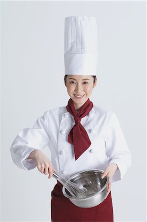 Attractive Japanese chef Foto de stock - Sin royalties Premium, Código: 622-08482670