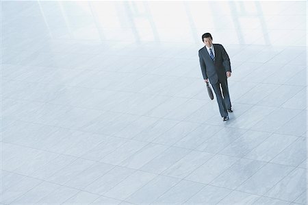 people walking into office building - Japanese businessman Stock Photo - Premium Royalty-Free, Code: 622-08482722