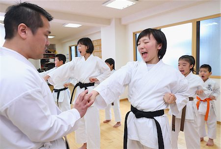 preteen boy teacher - Japanese kids karate class Stock Photo - Premium Royalty-Free, Code: 622-08657814