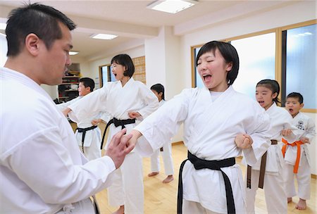 professor with student - Japanese kids karate class Stock Photo - Premium Royalty-Free, Code: 622-08657814