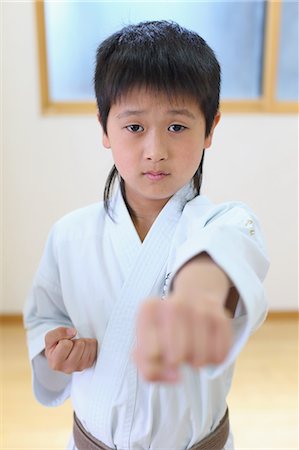 simsearch:622-08657807,k - Japanese kid in karate uniform training Stock Photo - Premium Royalty-Free, Code: 622-08657820