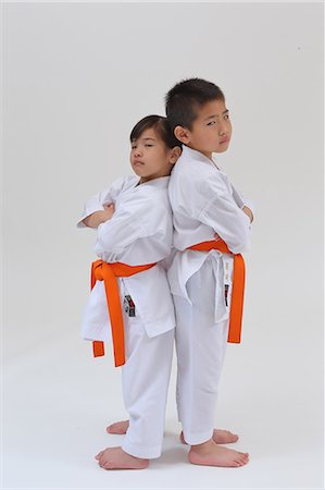 simsearch:622-08657807,k - Japanese kids in karate uniform on white background Stock Photo - Premium Royalty-Free, Code: 622-08657831