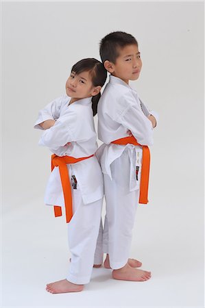 simsearch:622-08657807,k - Japanese kids in karate uniform on white background Stock Photo - Premium Royalty-Free, Code: 622-08657832
