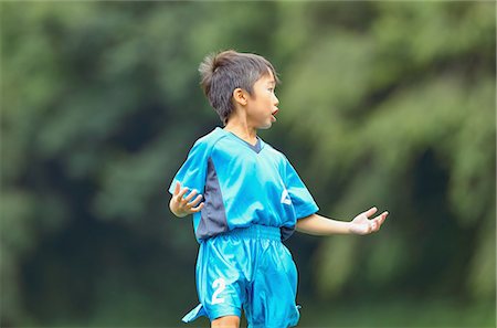 simsearch:622-08893916,k - Japanese kid playing soccer Stock Photo - Premium Royalty-Free, Code: 622-08893895