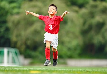 simsearch:622-08893916,k - Japanese kid playing soccer Stock Photo - Premium Royalty-Free, Code: 622-08893905