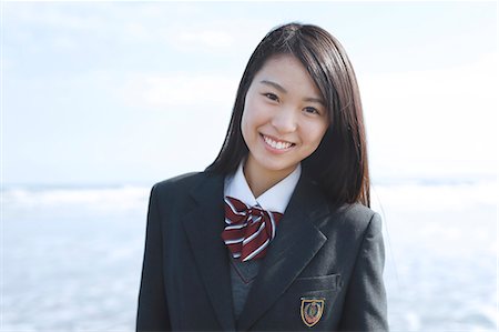 simsearch:614-02984853,k - Young Japanese woman in a high school uniform by the sea, Chiba, Japan Foto de stock - Sin royalties Premium, Código: 622-08949312