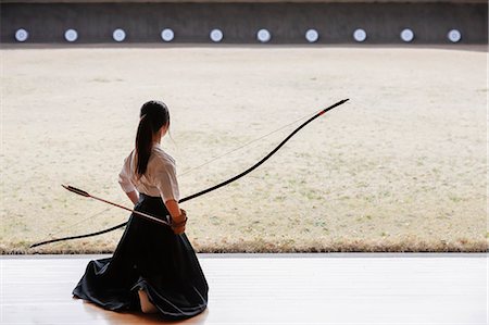 Japanese traditional archery athlete practicing Stock Photo - Premium Royalty-Free, Code: 622-09014468