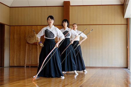 simsearch:859-09018730,k - Multi-ethnic group of traditional archery athletes practicing Stock Photo - Premium Royalty-Free, Code: 622-09014481