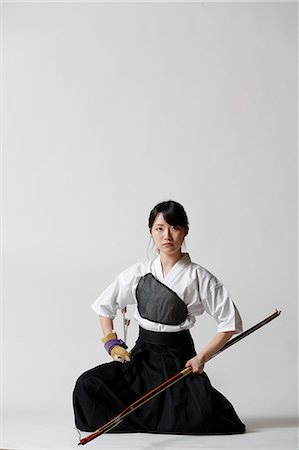 simsearch:859-09018730,k - Japanese traditional archery athlete against white background Stock Photo - Premium Royalty-Free, Code: 622-09014511