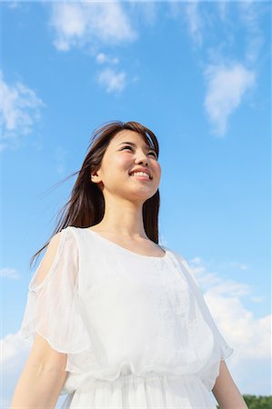 simsearch:622-09014015,k - Young Japanese woman against blue sky Stock Photo - Premium Royalty-Free, Code: 622-09014565