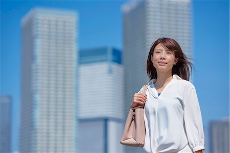 simsearch:622-09014015,k - Portrait of young Japanese woman downtown Tokyo, Japan Stock Photo - Premium Royalty-Free, Code: 622-09013959