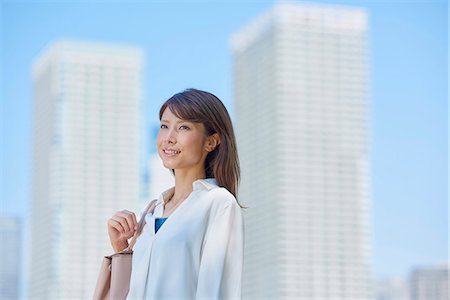simsearch:622-09014015,k - Portrait of young Japanese woman downtown Tokyo, Japan Stock Photo - Premium Royalty-Free, Code: 622-09013961